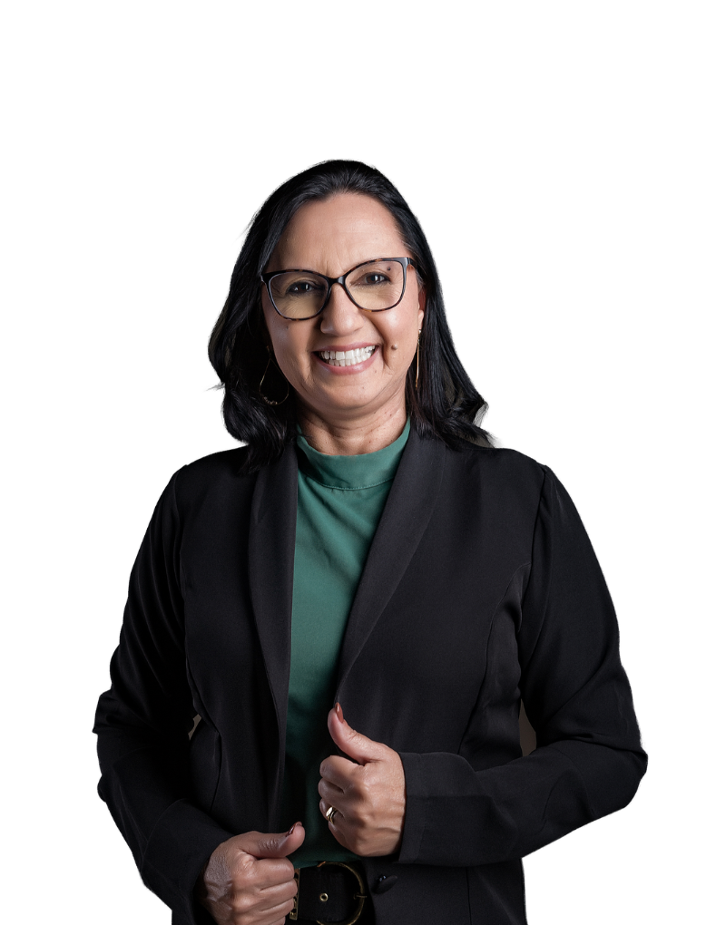 Sonia Dalva, mentora da Imersão Crocheteira Empreendedora, sorrindo, vestindo blazer preto sobre blusa verde